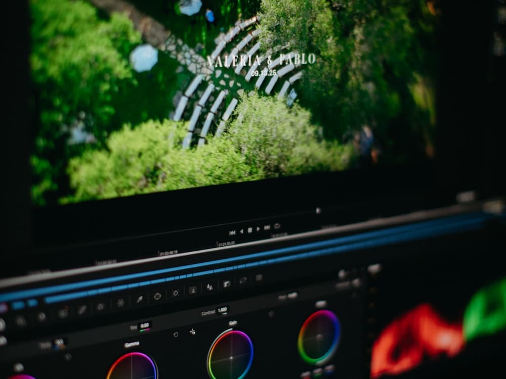Video editing software with color grading wheels on screen